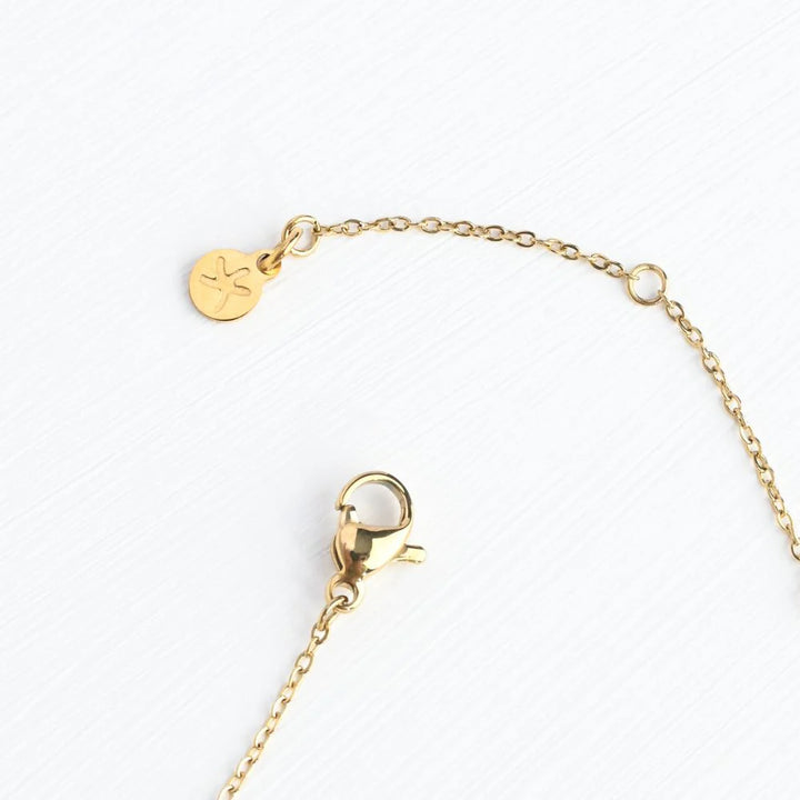Perfect Harmony Gold Cross Necklace